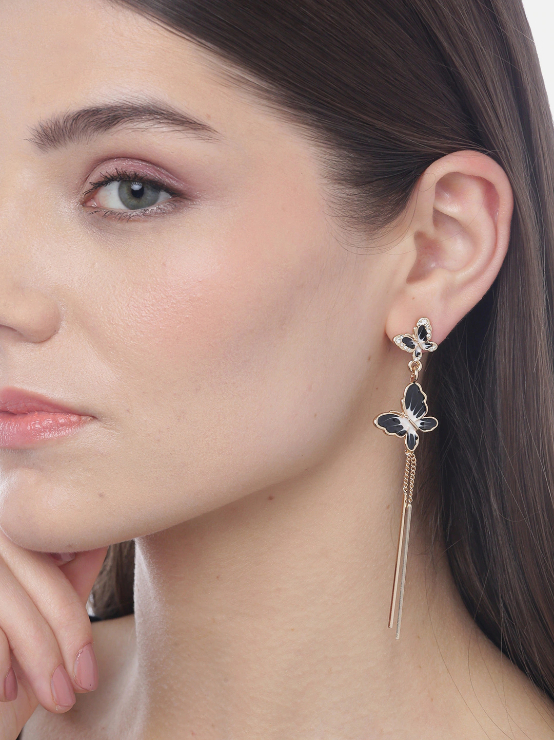YouBella Black  White Gold-Plated Stone Studded Butterfly Shaped Tasselled Drop Earrings