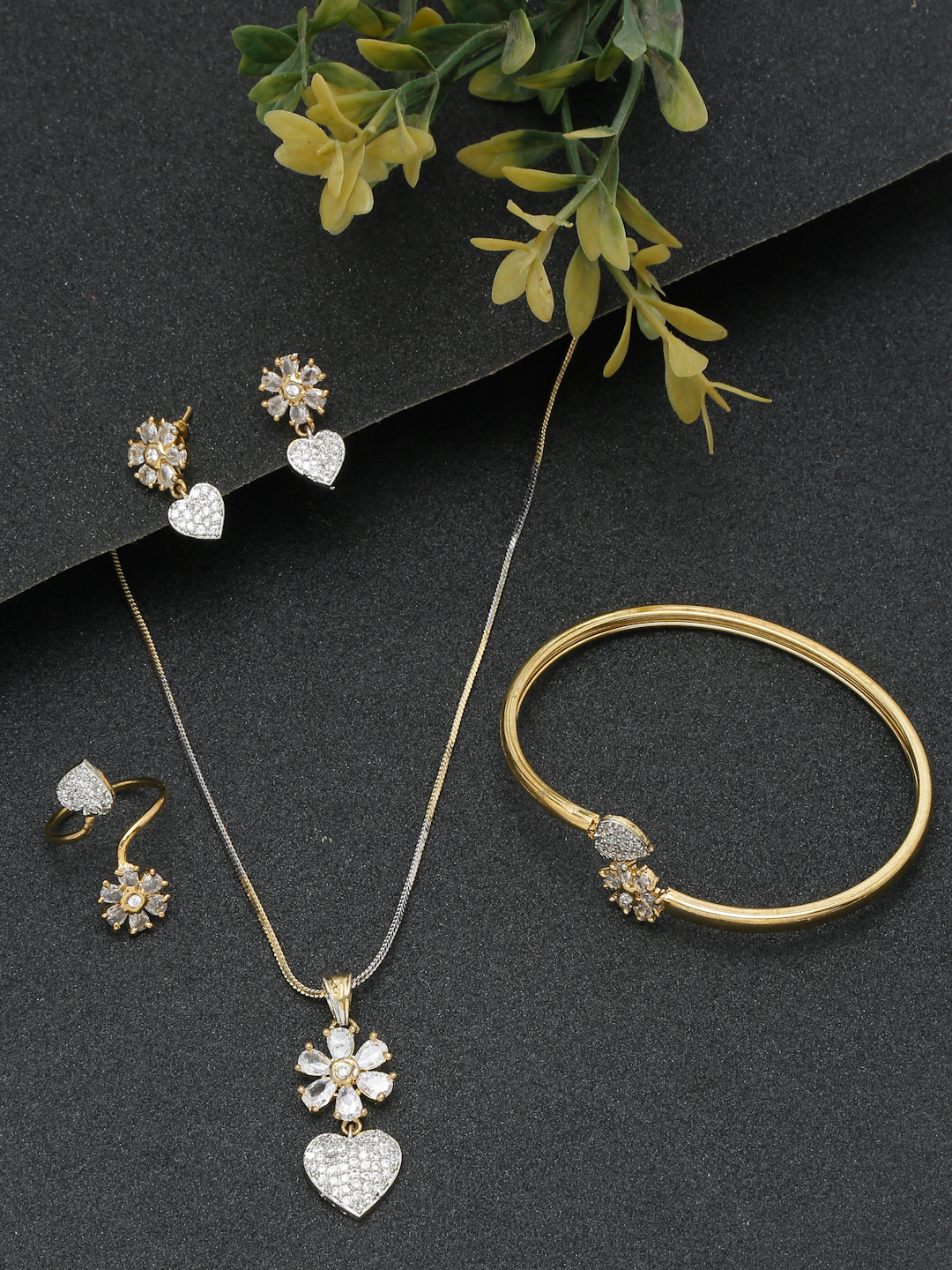 YouBella Jewellery Celebrity Inspired American Diamond Studded Necklace Jewellery Set with Earrings, Ring and Bracelet for Girls and Women (Gold) (YBNK_50542)